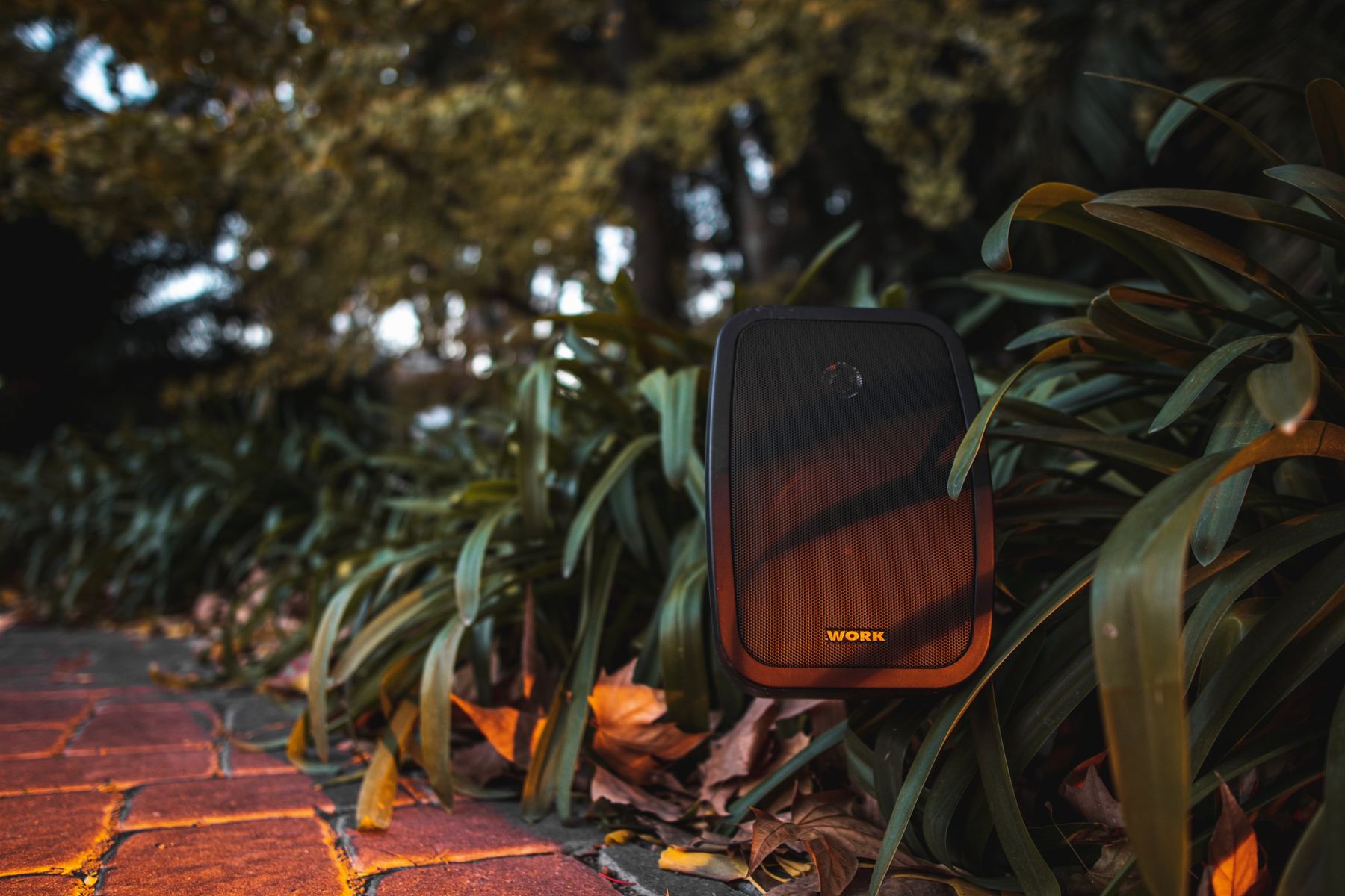 Work Pro outdoor loudspeaker among plants