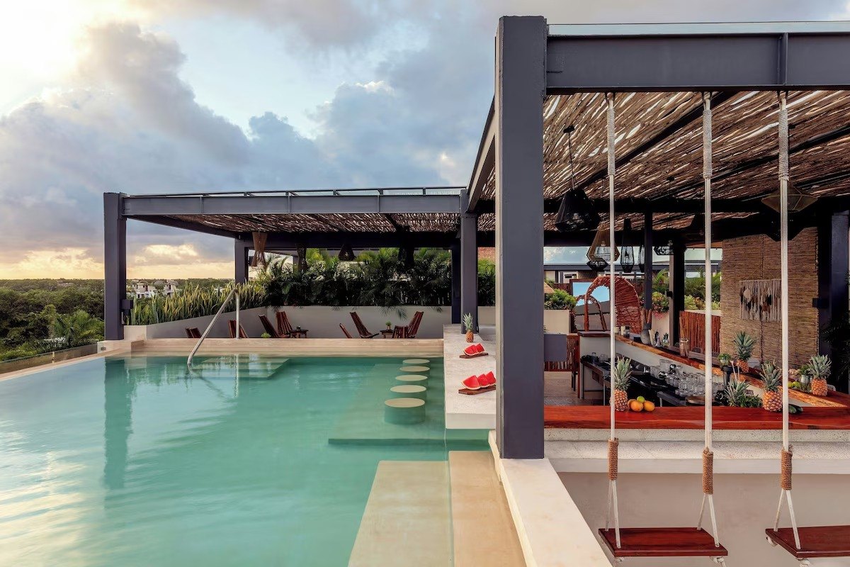 Bloom by Marriott rooftop with pool, bar and swings