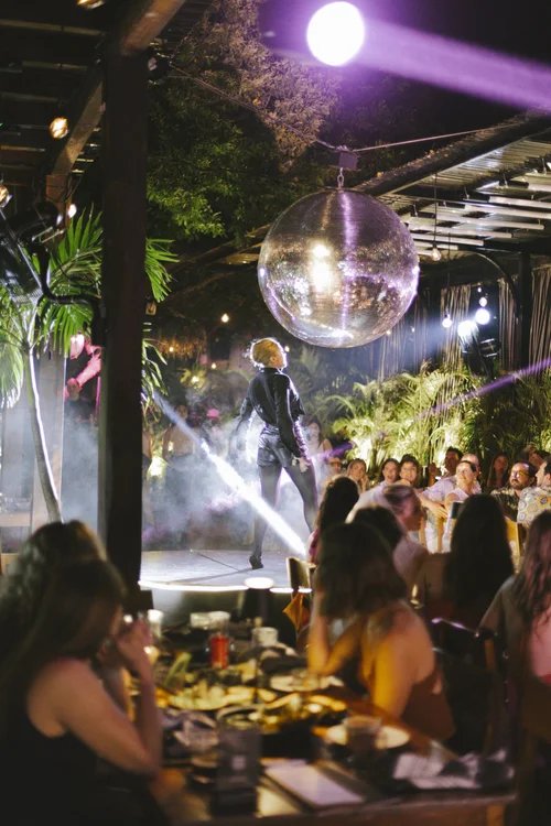 Live show with a mirror ball and lighting